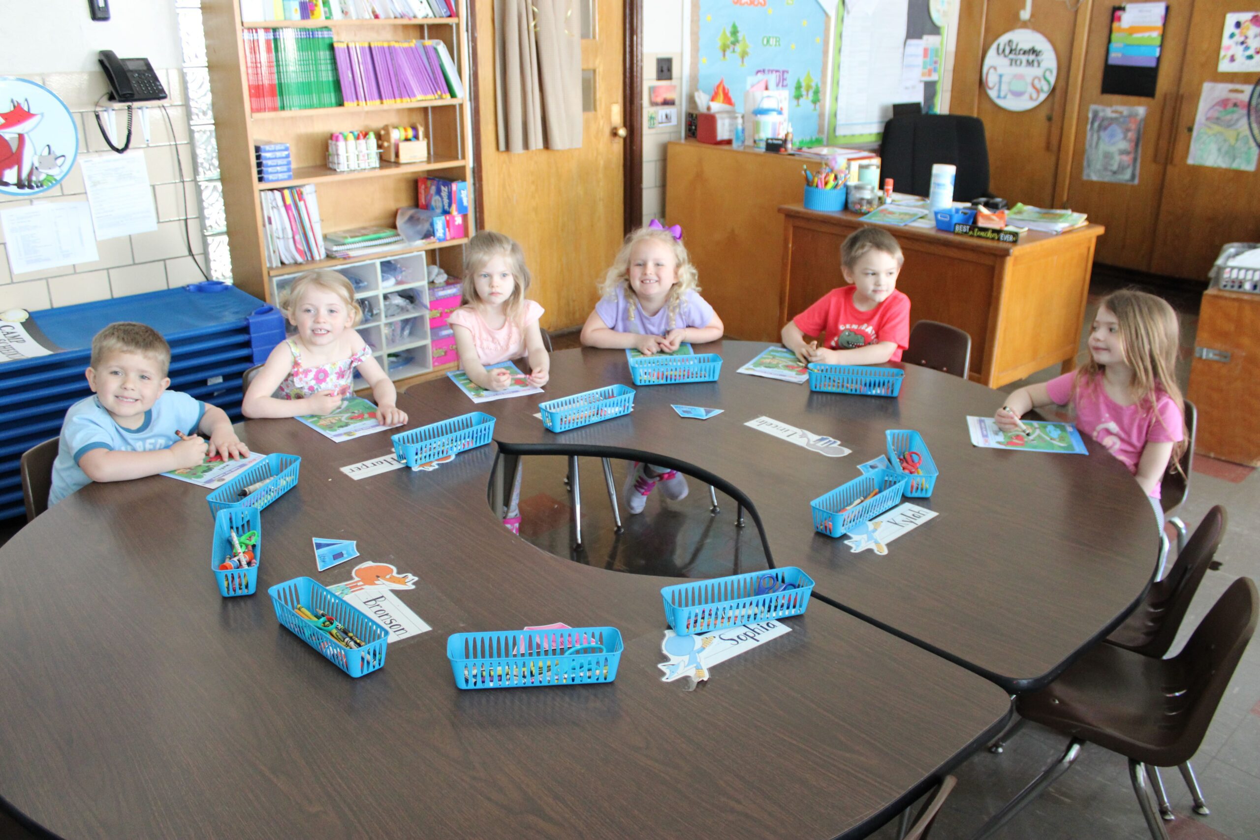 Preschool students in a classroom in their seats