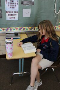 Student studying the bible
